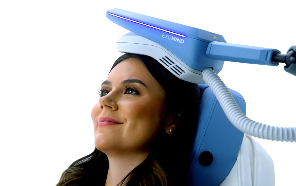 Patient receiving Exomind non-invasive neurostimulation therapy with the Exomind device